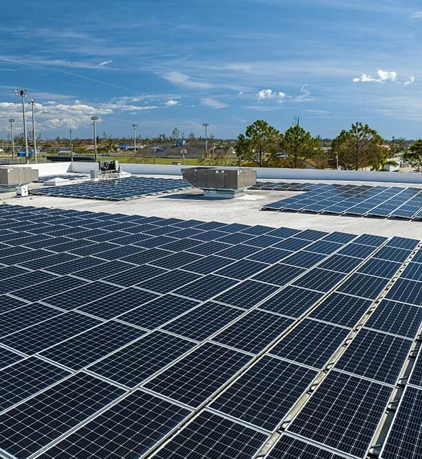 aerial-view-of-blue-photovoltaic-solar-panels-moun-2026-03-16-02-11-41-utc