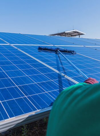 labor-working-on-cleaning-solar-panel-with-water-c-2026-03-26-07-20-29-utc